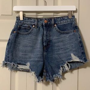 High rise distressed denim shorts